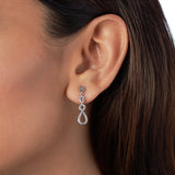 Silver Zircon Infinity Dance Earrings Dhanaza