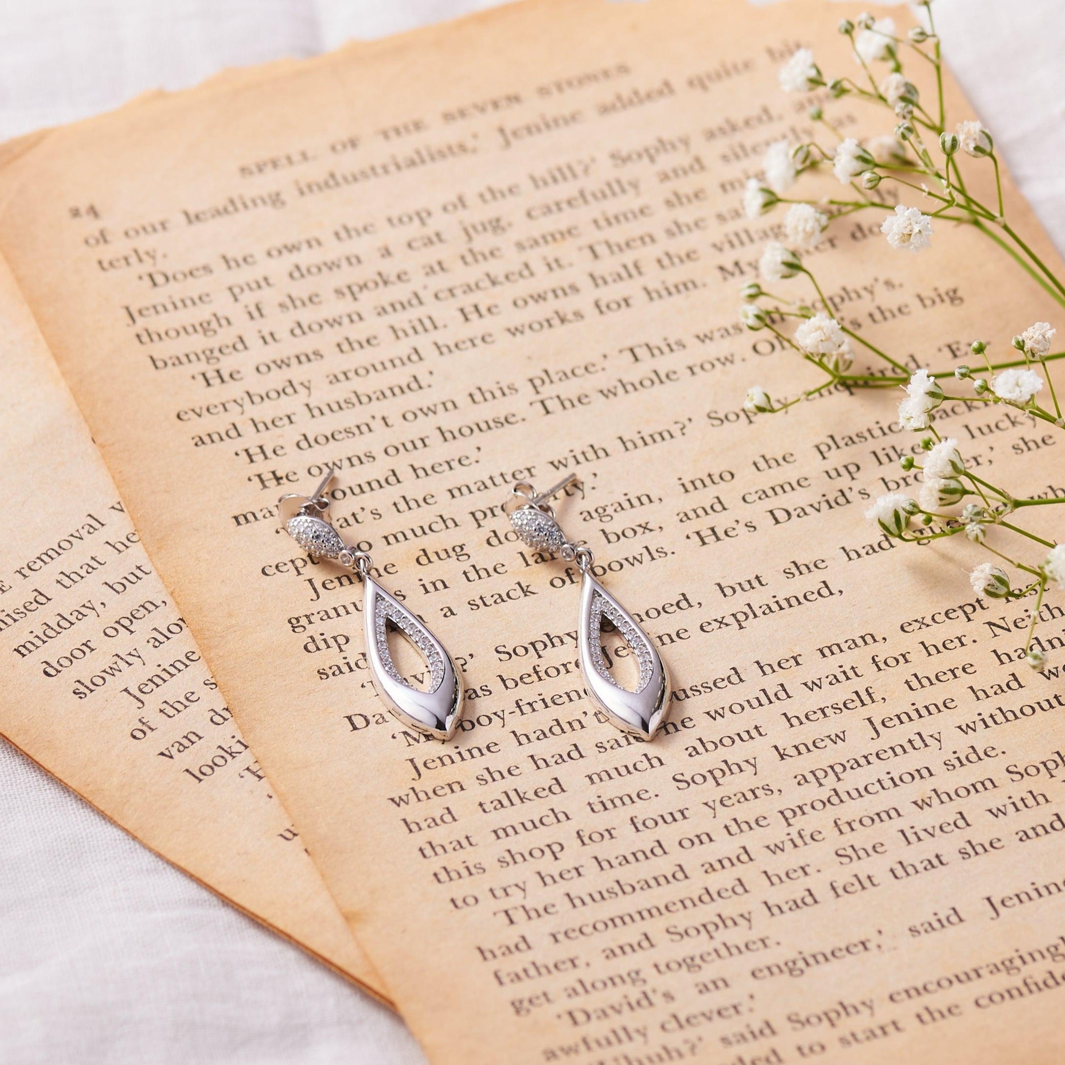 Silver Zircon Inlay Fish Earrings Dhanaza