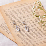 Silver Zircon Inlay Fish Earrings Dhanaza